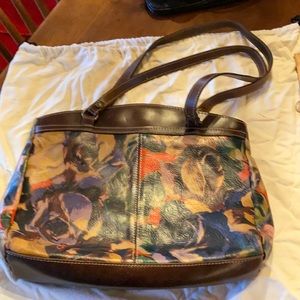 Patricia Nash leather shoulder bag with dust jacket. Winter bloom print